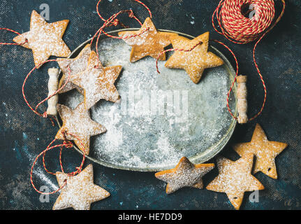 Christmas holiday star shaped gingerbread cookies for tree decoration Stock Photo