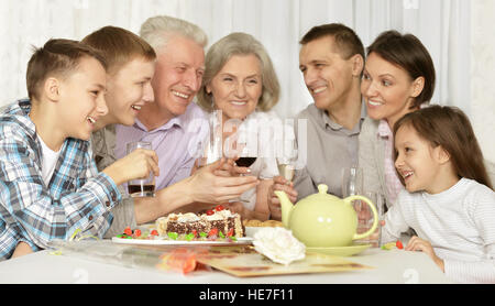 Happy family with cake Stock Photo