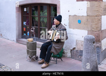 An accordionist playing in Petite France, Strasbourg Stock Photo