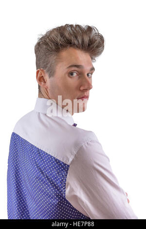 Stylish man dressed in a blue and white polkadot patterned shirt Stock Photo