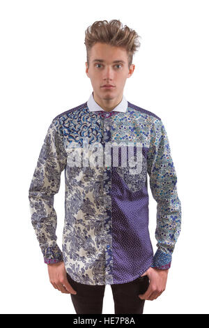 Stylish man dressed in a blue patterned statement shirt with black pants Stock Photo