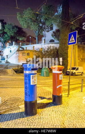 Letterboxes- blue for airmail, red for domestic post- Lisbon Portugal Stock Photo