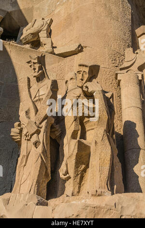 Sculpture of religious figures in stone on facade of the Sagrada Familia, Barcelona, Spain. Stock Photo