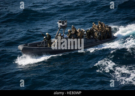 U.S. Marines aboard a rigid hull inflatable boat prepare to conduct a visit, board, search, and seizure drill exercise December 10, 2016 in the Pacific Ocean. Stock Photo