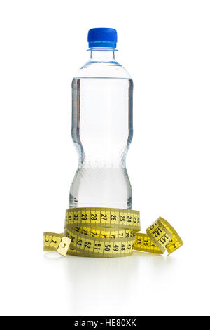 Water bottle and measuring tape isolated on white background. Stock Photo