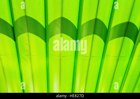 Fragment of green canvas striped marquee roof Stock Photo