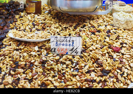 A mixture of nuts in the grocery market. On the price tag says 'special blend' at a price of 4.5 euros per kilogram 1/4 Stock Photo
