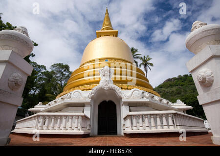 Golden Stupa at the Dambulla Cave Temple complex near the town of Dambulla in the Cultural Triangle in Sri Lanka. Stock Photo