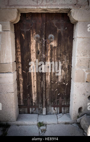 Old wooden door in Church Stock Photo
