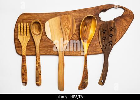 Kitchen equipment - wooden tools,cutting table isolated on white.