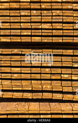 The stack of wooden boards in a sawmil. Stock Photo