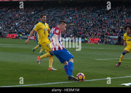 Madrid, Spain. 17th Dec, 2016. Gameiro (C) try to pass the ball. Atletico de Madrid won by 1 to 0 over Las Palmas whit a great goal of Saúl Ñiguez. © Jorge Gonzalez/Pacific Press/Alamy Live News Stock Photo