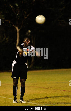 U.S. Army Staff Sgt. Greg McLean, a USA soccer team defender, throws in a ball during an Armed Forces Men's Soccer Championship Round Robin match against the U.S. Marine Corps at Morgan Sports Complex, Destin, Fla., Oct. 20, 2010. The Armed Forces Championships are conducted by the Armed Forces Sports council for the purpose of promoting, understanding, goodwill, and competition among the Armed Services. Sergeant McLean is stationed at Wheeler Army Airfield, Hawaii. ( Staff Sgt. Stephanie Jacobs/) Stock Photo