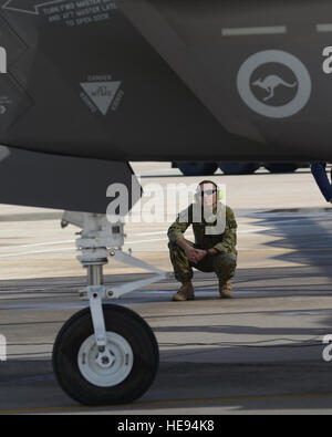 Royal Australian Air Force Maj. Nathan Draper, 61st AMU participant maintenance liaison officer and RAAF senior officer, observes the pre-launch procedures of the Australian F-35s Jan. 27 at Luke Air Force Base. The RAAF plans to eventually have 14 aircraft at Luke.  Staff Sgt. Timothy Boyer) Stock Photo