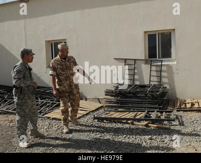 PAKTYA PROVINCE, Afghanistan – U.S. Army Sgt. 1st Class Timothy Dyke and British Sgt. Jamie Ryan asses the living quarters of the Afghan Army, April 21, at Forward Operating Base Thunder in Afghanistan’s Paktya province. The sergeants are renovating ANA barracks so the next class of soldiers will have a place to live while in training. Dyke is assigned to the Indiana National Guard unit; Ryan is assigned to the 6th Battalion Royal Regiment of London.  U.S. Air Force Airman 1st Class Laura Goodgame, RC-East Public Affairs Advisory Team) Stock Photo