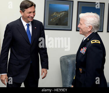 Brig. Gen. Giselle Wilz, NATO Headquarters Sarajevo commander, welcomes H.E. Borut Pahor, the President of the Republic of Slovenia, at Camp Butmir, Bosnia and Herzegovinia, May 28, 2016. The general and President Pahor discussed NATO-BiH relations, the upcoming Warsaw Summit, and the Slovenian valuable contribution to NATO HQ Sarajevo mission in BiH. The president is in BiH for the Brdo-Brijuni Process meeting in Sarajevo. Stock Photo