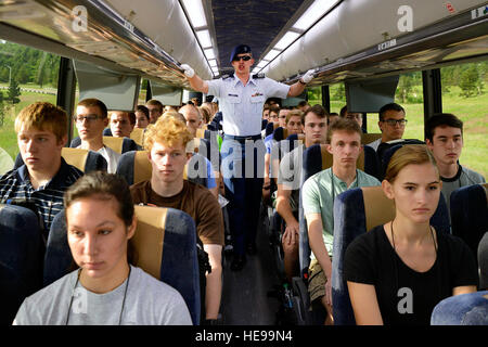 A basic cadet training cadre member provides direction to basic cadets as they leave the U.S. Air Force Academy's Doolittle Hall and head for the cadet area in Colorado Springs, Colo., June 25, 2015. More than 1,000 young adults processed into the Academy and began BCT as members of the Class of 2019. Jason Gutierrez) Stock Photo