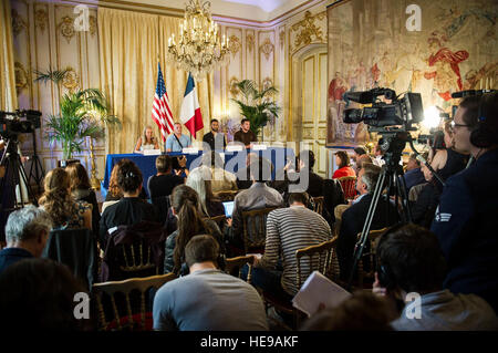 Jane D. Hartly, the U.S. ambassador to France, Airman 1st Class Spencer Stone and his two friends speak at a press conference in Paris Aug. 23, 2015, following a foiled attack on a French train. Stone was on vacation with his childhood friends, Army Spc. Aleksander Skarlatos and Anthony Sadler, when an armed gunman entered their train carrying an assault rifle, a handgun and a box cutter. The three men, with the help of a British passenger, subdued the gunman after his rifle jammed. Tech. Sgt. Ryan Crane) Stock Photo