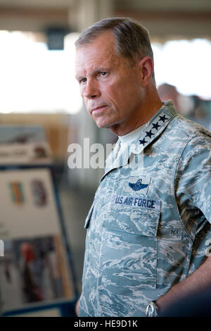 Gen. William M. Fraser III, commander of U.S. Transportation Command, visited numerous organizations at Travis AFB, Calif. July 8-9, 2013. The general met with airmen and civilians to learn about their contributions to the command's mission. (Air Force photo/Ken Wright) Stock Photo