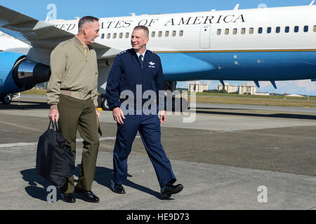 Marine Corps Gen. Joseph F. Dunford, the chairman of the Joint Chiefs of Staff, speaks with Air Force Lt. Gen. John Dolan, U.S. Forces, Japan commander, during his visit to Yokota Air Base, Japan, Nov. 3, 2015. The generals left Yokota to visit with members of the Japan Self-Defense Forces and the U.S. Embassy in downtown Tokyo.  Staff Sgt. Cody H. Ramirez Stock Photo