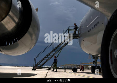 Colombian air force maintainers prepare a Colombian Boeing KC-767 multi-mission tanker transport jet during Red Flag 12-4 July 23, 2012, at Nellis Air Force Base, Nev. The Israel Aerospace Industries completed modification of the first 767 MMTT in June 2010, with changes including the addition of wing refueling pods and a side cargo door.  Airman 1st Class Daniel Hughes) Stock Photo