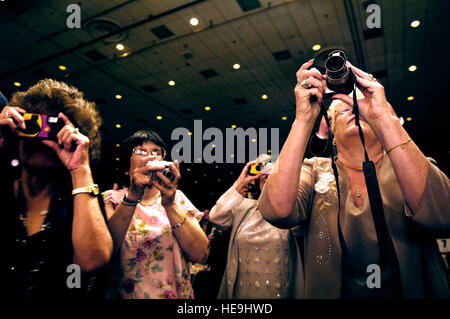 Women of the VFW react to the awarding of Country music star, Charlie Daniels, at the Veterans of Foreign Wars (VFW) convention after being awarded to the VFW Hall of Fame at Reno, Nev. Aug. 28, 2006. Dept. of Defense  U.S. Air Force Staff Sgt. D. Myles Cullen (released) Stock Photo