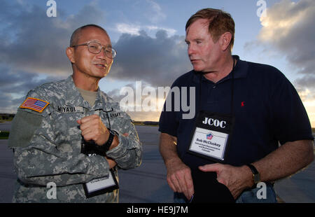 U.S. Army Major Gen. Vern Miyagi, Mobilization Assistant to the Commander, United States Pacific Command, talks with former State Representative from Fort Collins, Colorado, Bob McCluskey on Anderson AFB, Guam during the 74th Joint Civilian Orientation Conference (JCOC), Nov. 6, 2007.  JCOC is a Secretary of Defense sponsored program for America's leaders interested in expanding their knowledge of the military and national defense. JCOC is the oldest existing Pentagon outreach program and has been held more than 73 times since its inception in 1948. Defense Dept.  U.S. Air Force Tech. Sgt. Jer Stock Photo