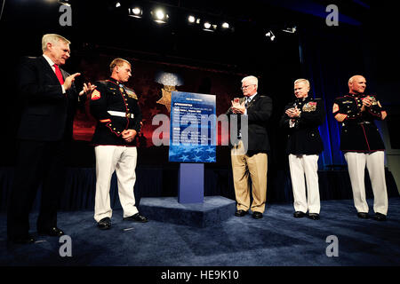 Secretary of the Navy Ray Mabus,  Commandant of the Marine Corps Gen. James Amos, and Sgt. Maj. of the Marine Corps Sgt. Maj. Michael Barrett join Medal of Honor recipient Sgt. Dakota L. Meyer, and his father, Mike, during a ceremony inducting Sgt. Meyer into the Pentagon's Hall of Heroes, Sept. 16, 2011.  Tech. Sgt. Jacob N. Bailey, U.S. Air Force Stock Photo