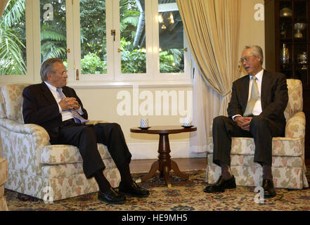 050605-F-7203T-155 Secretary of Defense Donald H. Rumsfeld (left) meets with Singapore's Senior Minister Goh-Chok Tong at the Istana on June 5, 2005.  Rumsfeld is in Singapore to attend the 4th International Institute for Strategic Studies Asia Security Conference: The Shangri-La Dialogue in Singapore.  The Asia Security Conference brings ministers of defense and other senior officials of Pacific nations together to discuss such topics as terrorism, piracy and defense capabilities in the region.   Tech. Sgt. Cherie A. Thurlby, U.S. Air Force.  (Released) Stock Photo