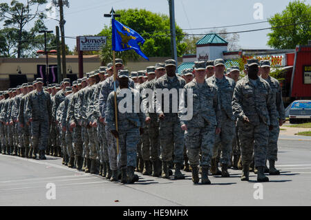 U.S. Air Force Airmen from Eglin Air Force Base, march in honor of the Doolittle Raiders in Fort Walton Beach Fla., April 20, 2013. As Part of their reunion tour three surviving Raiders watched the parade commemorating the bombing over Tokyo in 1942. (U.S. Air Force Photo/ Staff Sgt. John Bainter) Stock Photo