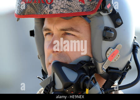 U.S. Air Force Capt. Dennis Muller, a pilot from the 13th Fighter Squadron at Misawa Air Base, Japan, watches competitors during a scramble at Exercise Eager Tiger May 12, 2014, at an air base in northern Jordan. Throughout the exercise, fighter pilots from the U.S. and Jordan flew together multiple times to practice various tactics and techniques. Muller hails from New Orleans.  Staff Sgt. Brigitte N. Brantley Stock Photo