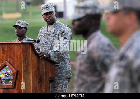 GUANTANAMO BAY, Cuba – Army Lt. Col. Alexander Conyers, 525th Military Police Battalion commander, speaks during the unit’s change of command ceremony at Bulkeley Field, Joint Task Force Guantanamo, June 4, 2010. The 193rd MP Company is responsible for a portion of the guard duties at JTF Guantanamo. JTF Guantanamo conducts safe, humane, legal and transparent care and custody of detainees, including those convicted by military commission and those ordered released by a court. The JTF conducts intelligence collection, analysis and dissemination for the protection of detainees and personnel work Stock Photo