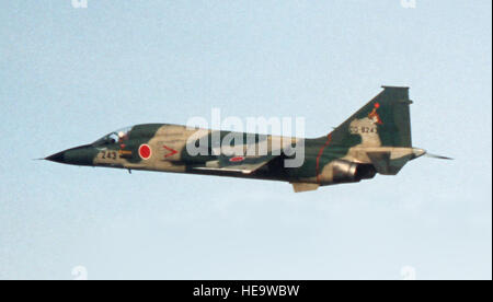 An air-to-air left side view from left to right of a Japanese F-1, two F-15 Eagles, and two Japanese F-4EJ Phantom II aircraft flying in formation during the joint Exercise COPE NORTH 85-1. Stock Photo