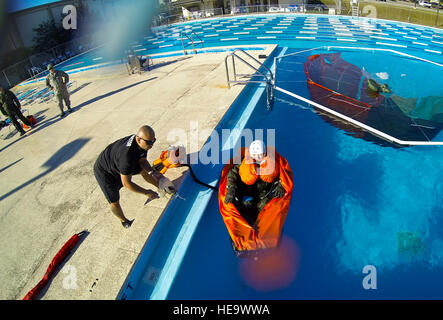 F-35 pilots participate in water survival training at Eglin Air Force Base, Florida, using simulated scenarios to learn life raft procedures and emergency ejection responses over water. Stock Photo