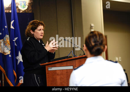 Lt. Gen. Susan Helms, former 14th Air Force, Air Force Space Command, Joint Functional Component Command for Space and U.S. Strategic Command commander, speaks to Team Buckley members during a dessert social March 21, 2014, at the Air Reserve Personnel Center conference room on Buckley Air Force Base, Colo. Helms visited Buckley in honor of Women's History Month to speak on the importance of having a positive attitude and the power of women believing in themselves.  Airman 1st Class Samantha Saulsbury Stock Photo