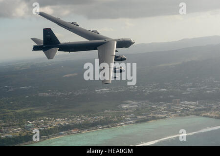 A U.S. Air Force B-52H Stratofortress from the 96th Expeditionary Bomb Squadron, flies off the coast of Guam during a photo exercise at Cope North 15, Feb. 17, 2015. Through training exercises such as Exercise Cope North 15, the U.S., Japan and Australia air forces develop combat capabilities, enhancing air superiority, electronic warfare, air interdiction, tactical airlift and aerial refueling.  Tech. Sgt. Jason Robertson