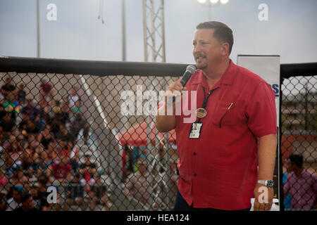 Brent Norquist, deputy assistant chief of staff, Marine Corps Community Services, speaks with the Marines before the bouts begin during the Mixed Marital Arts Fight Night Live at Del Valle Field aboard the Marine Corps Air Ground Combat Center, Twentynine Palms, Calif., June 10, 2016.   Lance Cpl. Devin Andrews Stock Photo