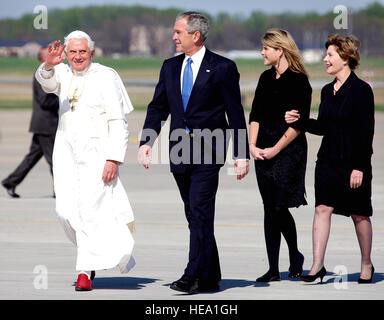 Pope Benedict XVI is greeted by President George W. Bush and Laura Bush at Andrews Air Force Base, Md., to begin his weeklong trip to the United States.  The Pontiff, selected as the 265th pope on April 19, 2005, will meet with the President at the White House, address the presidents of Roman Catholic Colleges and Universities, and hold mass at the Nationals Park in Washing to D.C. and Yankee Stadium in New York City.   Tech Sgt. Suzanne M. Day)(Released) Stock Photo