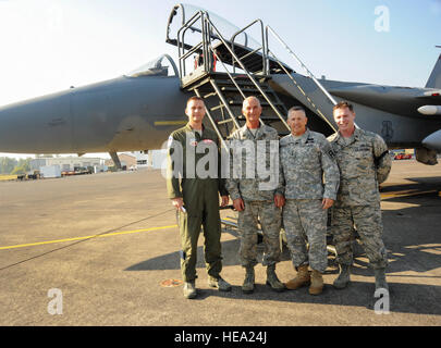 U.S. Army Lt. Gen. Mick Bednarek, Commanding General First U.S. Army, stands with members of the 142nd Fighter Wing and one of the unit's F-15C Eagles, during his visit to the Portland Air National Guard Base, Portland, Ore., Sept. 14, 2012.  Image pictured (from left to right) Oregon Air National Guard Col. Rick Wedan, Vice Commander 142nd Fighter Wing, Master Sgt. Mark Billmyer, Crew Chief, Lt. Gen. Bednarek, and Maj. Brian Kroller, Intelligence Officer for the 142nd Fighter Wing. ( Tech. Sgt. John Hughel, 142nd Fighter Wing Public Affairs Department Stock Photo