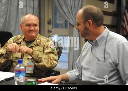 Kabul -Dr. Jack D. Kem, Deputy to the Commander, NATO Training Mission – Afghanistan / Commander, Combined Security Transition Command - Afghanistan, speeks to Hungarian Defense Minister Dr. Csaba Hende while visiting Camp Eggers June 18,2010. Dr. Hende visited Camp Eggers to attend a situation brief on training forces.  Staff Sergeant Matt Davis) Stock Photo