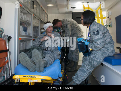 An anti-hijacking exercise conducted by the 60th Air Mobility Wing and other outside agencies played out at Travis Air Force Base, Calif., June 23, 2015.  A C-17 Globemaster played the role of the hijacked aircraft where a crew member took control trying to get to the Philippines to join the Islamic State of Iraq (ISIS). The aircraft was intercepted and turned back to Travis AFB by two Western  Air Defense Air National Guard F-15 Eagles out of Fresno, California and forced to land. After a brief negotiation process, members of the 60 Security Forces Squadron stormed the plane, neutralized the  Stock Photo