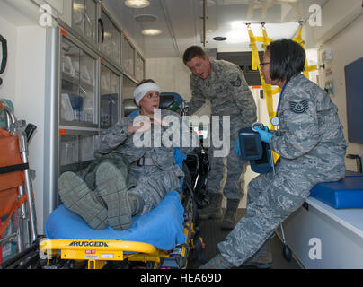 An anti-hijacking exercise conducted by the 60th Air Mobility Wing and other outside agencies played out at Travis Air Force Base, Calif., June 23, 2015.  A C-17 Globemaster played the role of the hijacked aircraft where a crew member took control trying to get to the Philippines to join the Islamic State of Iraq (ISIS). The aircraft was intercepted and turned back to Travis AFB by two Western  Air Defense Air National Guard F-15 Eagles out of Fresno, California and forced to land. After a brief negotiation process, members of the 60 Security Forces Squadron stormed the plane, neutralized the  Stock Photo