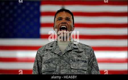 Lt. Col. Tom Highsmith, 816th Global Mobility Squadron director of operations, issues commands to his unit during the inactivation ceremony of the 816th Contingency Response Group here June 11. The units were casing their colors after five years of service in the 621st Contingency Response Wing. Stock Photo