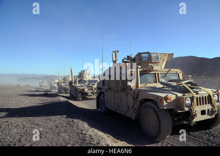 U.S. Marine Corps Humvees, Combat Logistics Battalion 13, 4th Marine Regiment, Camp Pendleton, Calif., conduct a site survey during Integrated Training Exercise 2-15 at Marine Corps Air Ground Combat Center (MCAGCC) Twentynine Palms, Calif., Feb 14, 2015. MCAGCC conducts relevant live-fire combined arms training, urban operations, and Joint/Coalition level integration training that promotes operational forces readiness.  Technical Sgt. Daniel St. Pierre Stock Photo