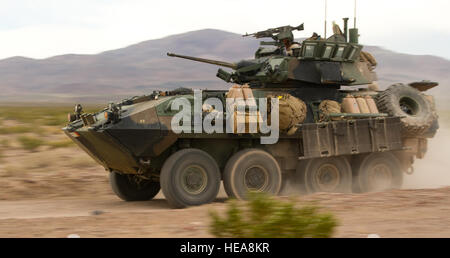 An LAV-25 Light Armor Vehicle 2nd Light Armor, Reconnaissance Battalion (2nd LAR BN) from Camp Lejeune, N.C., moves toward the front line of a training exercise on May 20, 2015, during Integrated Training Exercise 3-15 at Marine Corps Air Ground Combat Center (MCAGCC) Twentynine Palms, Calif. MCAGCC conducts relevant live-fire combined arms training, urban operations, and joint/coalition level integration training that promotes operational forces readiness.  Senior Airman Steven A. Ortiz/ Released) Stock Photo