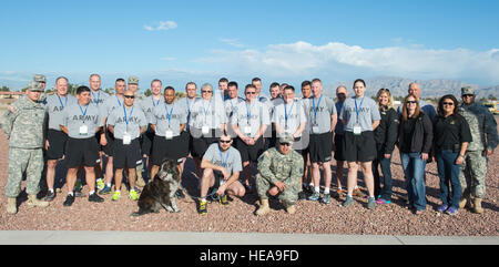 Soldiers from the U.S. Army Warior Transition Command participate in the Air Force wounded warrior trials on Nellis AFB, Nev., Feb. 27, 2015. The Air Force Trials are an adaptive sports event designed to promote the mental and physical well-being of seriously ill and injured military members and veterans. More than 105 wounded, ill or injured service men and women from around the country will compete for a spot on the 2015 U.S. Air Force Wounded Warrior Team which will represent the Air Force at adaptive sports competitions throughout the year.  Senior Airman David R. Cooper) Stock Photo