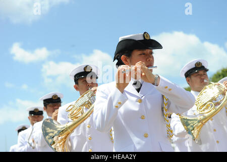 HONOLULU, Hawaii - The Japanese Maritime Self-Defense Force (JMSDF) band plays the Japanese National Anthem during a wreath ceremony at the National Memorial Cemetery of the Pacific in Honolulu, Hawaii on June 9, 2010.  The junior officers of the JMSDF are on a training mission in which they will visit 16 ports in 12 countries in a span of 156 days and Hawaii was their first stop on this trip. (U.S.  Air Force photo/Tech Sgt. Cohen A. Young) Stock Photo