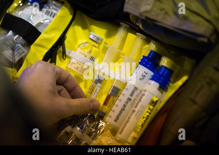 U.S. Air Force Lt. Col. Richard Degrosa, emergency room doctor, 86th Medical Group, Ramstein Air Base, Germany, checks the expiration date of medical supplies in preparation for training at Joint Readiness Training Center (JRTC), Intermediate Staging Base, Alexandria, La., Jan. 15, 2014. Service members at JRTC 14-03 are educated in combat patient care and aeromedical evacuation in a simulated combat environment.  Master Sgt. John R. Nimmo, Sr./) Stock Photo