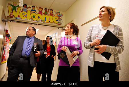 Cindy Scaparrotti, wife of U.S. Army Gen. Curtis Scaparrotti, and spouses of 18th Wing leadership view kids artwork at Amelia Earhart Intermediate School during a visit to Kadena Air Base, Japan, Jan. 30, 2014. During the visit, Cindy and spouses of 18th Wing leadership toured Amelia Earhart Intermediate School, the Airman and Family Readiness Center, base housing, the 18th Medical Group and the Kadena Gift Corner to learn and see the differences between Republic of Korea and Kadena.  Naoto Anazawa) Stock Photo