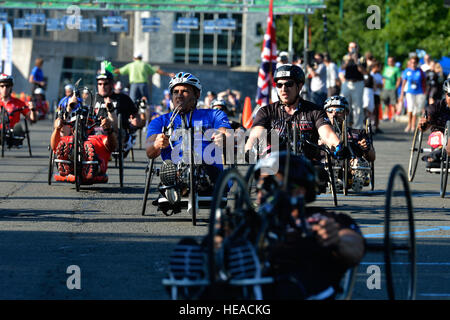 U.S. Air Force Tech. Sgt. Brian Williams from Sierra Vista, Ariz., races in the cycling competition at the 2016 DoD Warrior Games held at the U.S. Military Academy at West Point, NY, June 18, 2016. The DoD Warrior Games, June 15-21, is an adaptive sports competition for wounded, ill and injured service members and Veterans. Athletes representing teams from the Army, Marine Corps, Navy, Air Force, Special Operations Command and the United Kingdom Armed Forces compete in archery, cycling, track and field, shooting, sitting volleyball, swimming, and wheelchair basketball. ( Staff Sgt. Carlin Lesl Stock Photo